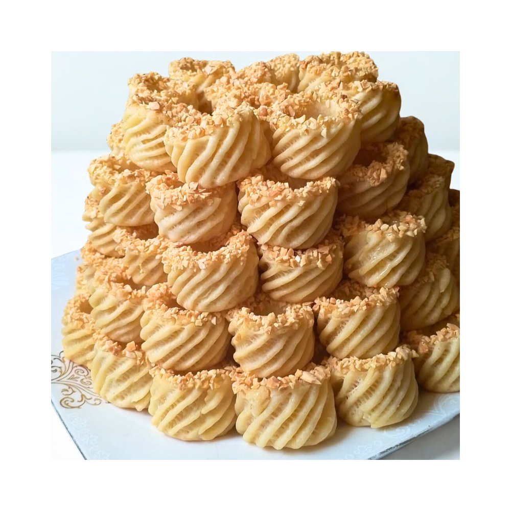 Kaek aux amandes : Le Biscuit Amande-Cannelle, Trésor des Ruelles de Fès Kaek aux amandes : Le Biscuit Amande-Cannelle, Trésor des Ruelles de Fès