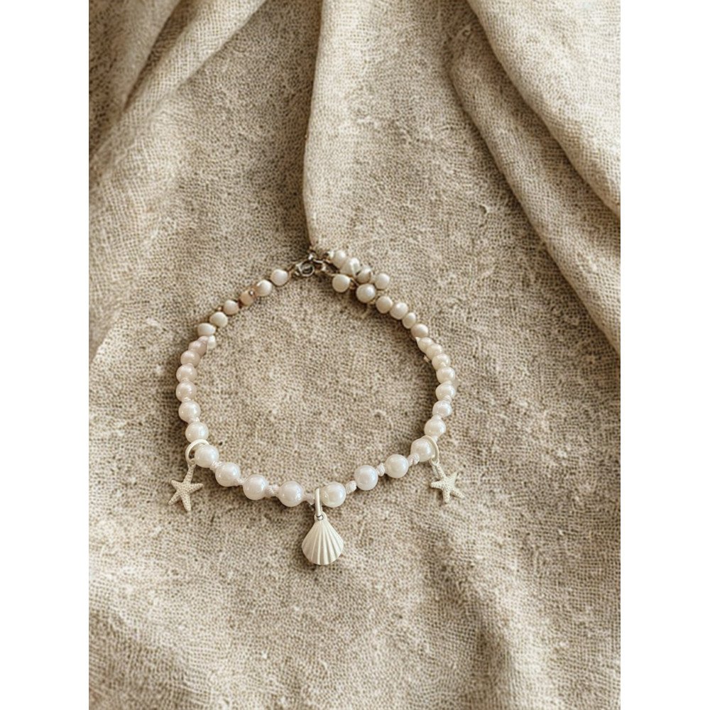 Collier en perles et coquillage Collier en perles et coquillage